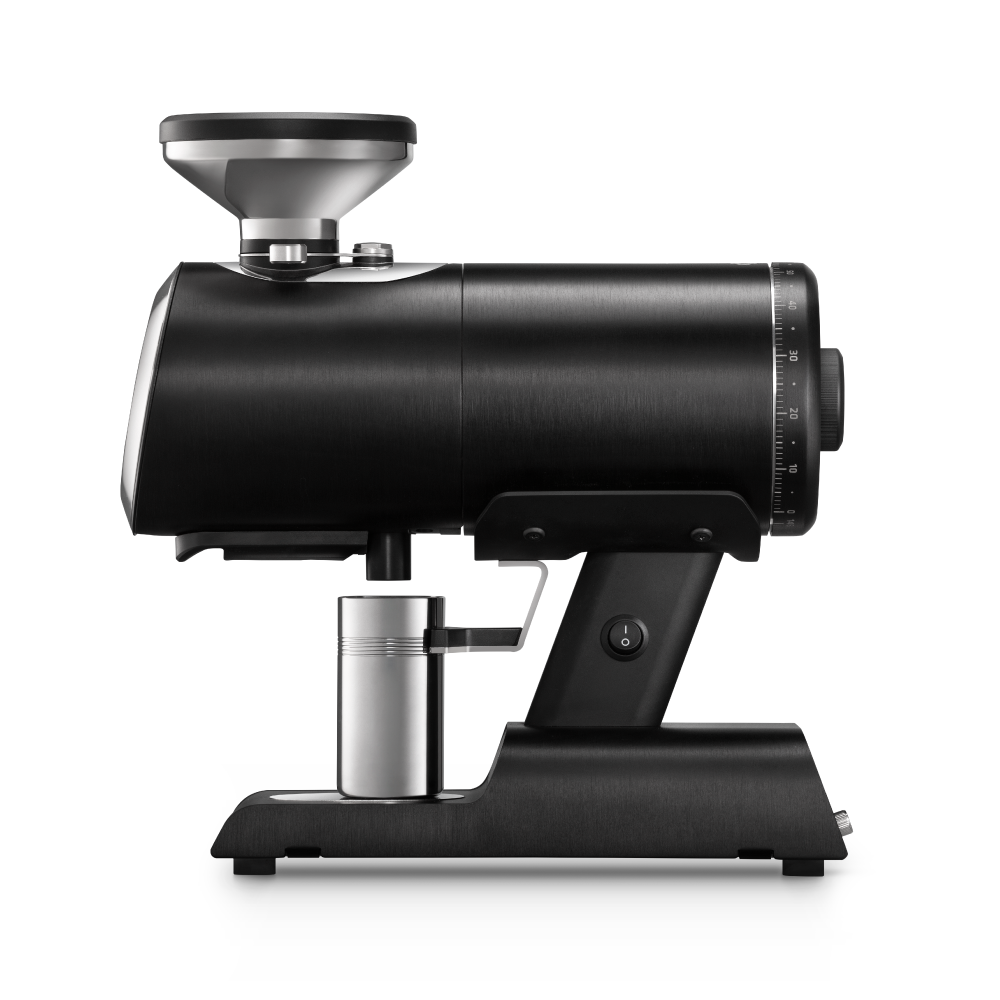 Black coffee grinder with metallic components on a white background